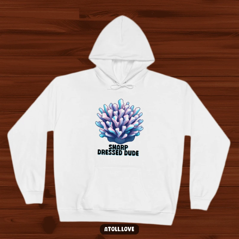 Funny geometric reef hoodie featuring a sharp cyan and white pattern on a dark base, offering warmth and artistic style.